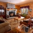Log home living room with fireplace