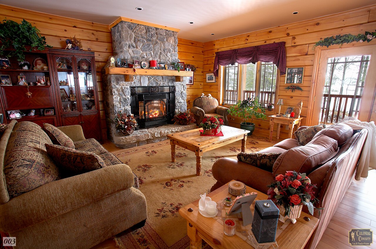 Log home living room with fireplace, Peterborough Ontario